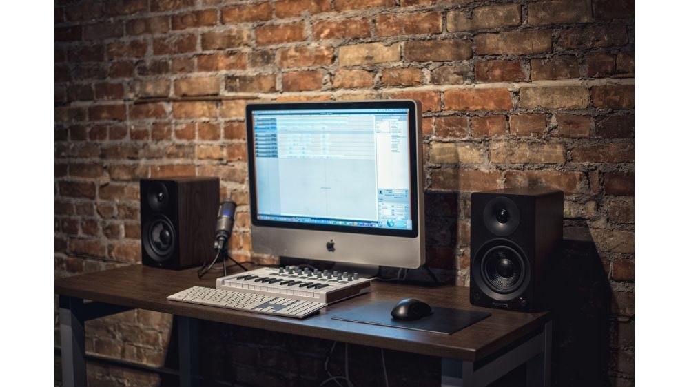 Powered Speakers vs. Studio Monitors: What's the Difference?
