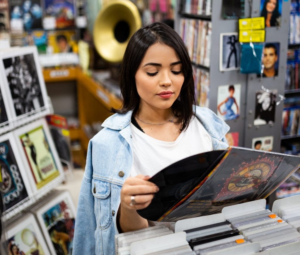 Inspecting used record for damage and quality