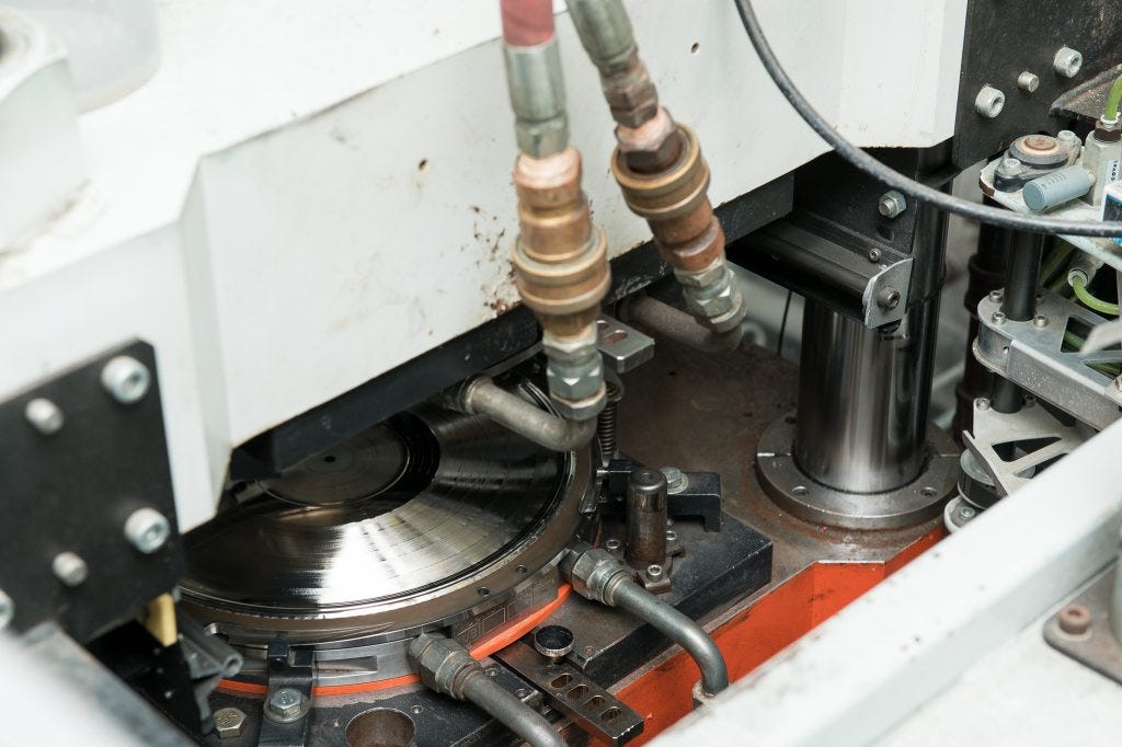 Record Stamper in a record press